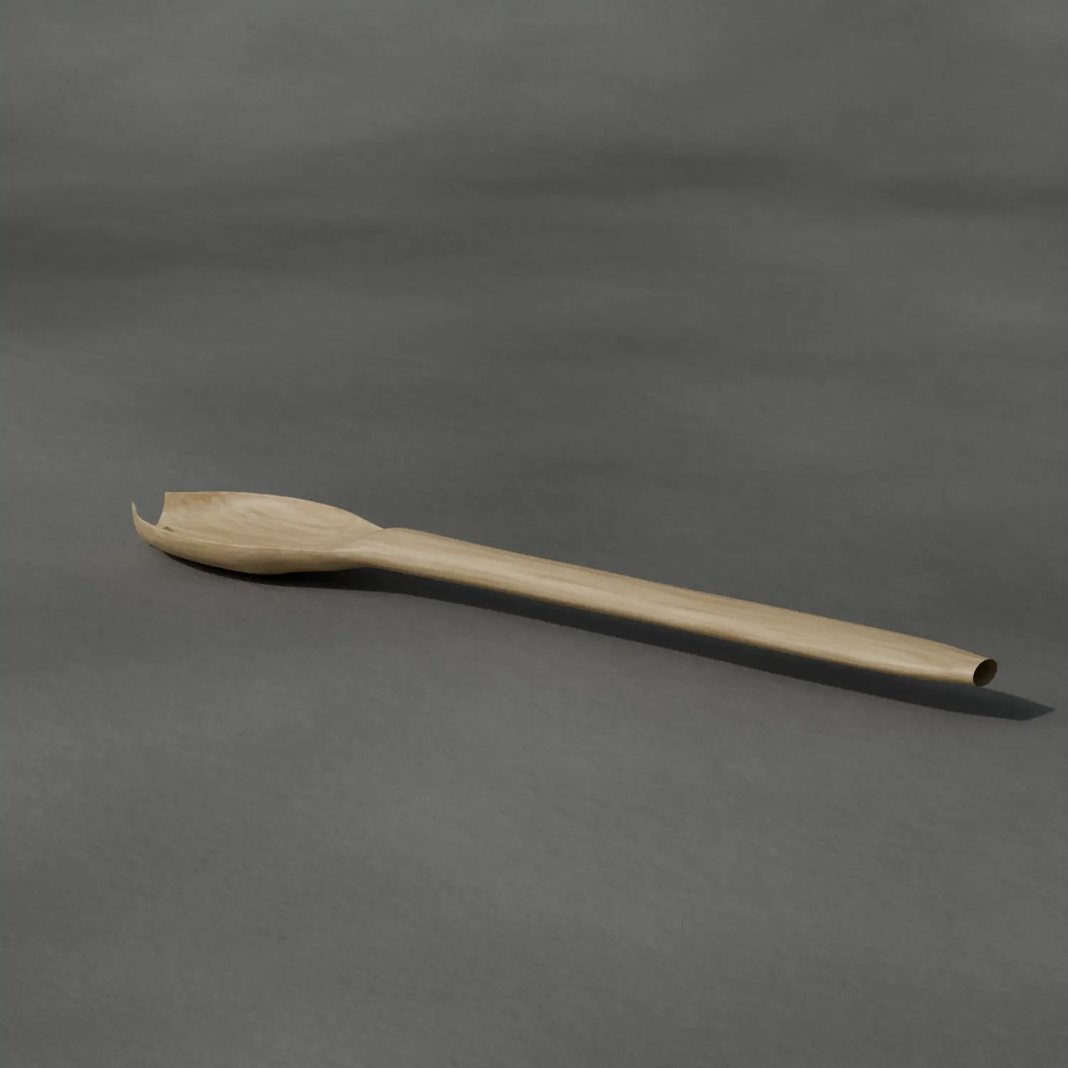 Träsked för saltskrubb på sten, i dagsljus